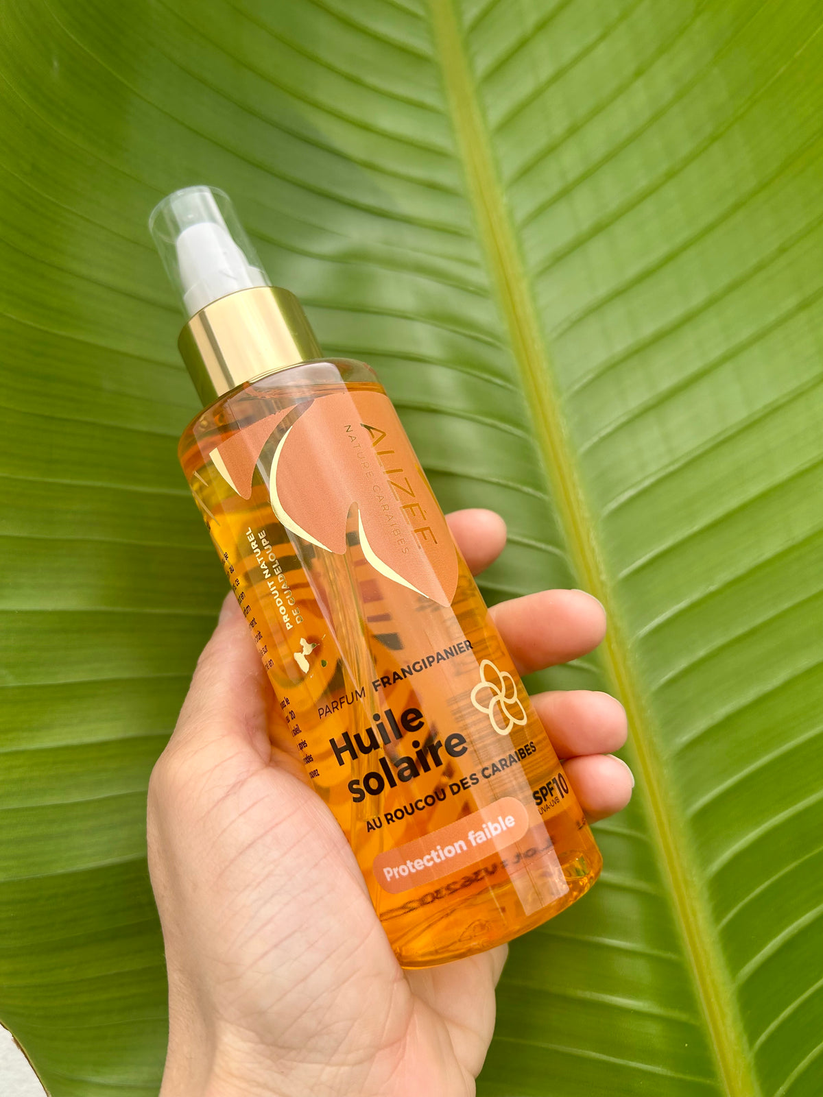 Huile solaire protection faible au roucou SPF10 de Guadeloupe